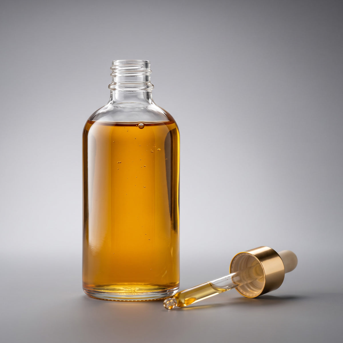 Flacon d’huile capillaire et pipette